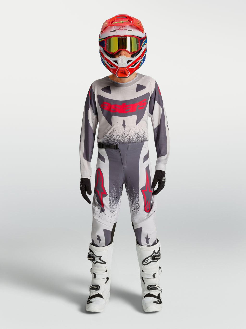 Alpinestars Supertech Swan bukser, motocross-racerudstyr til unge, grå og rød fluo, atletisk pasform.
