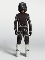 Alpinestars Youth Fluid Apex V2 Pants, black and silver youth MX pants with ergonomic riding fit, shown from the rear.