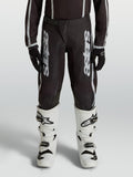 Alpinestars Fluid Apex V2 bukser til unge, sort og sølv motocrossbukser, slidstærkt 600D polystof, ergonomisk pasform