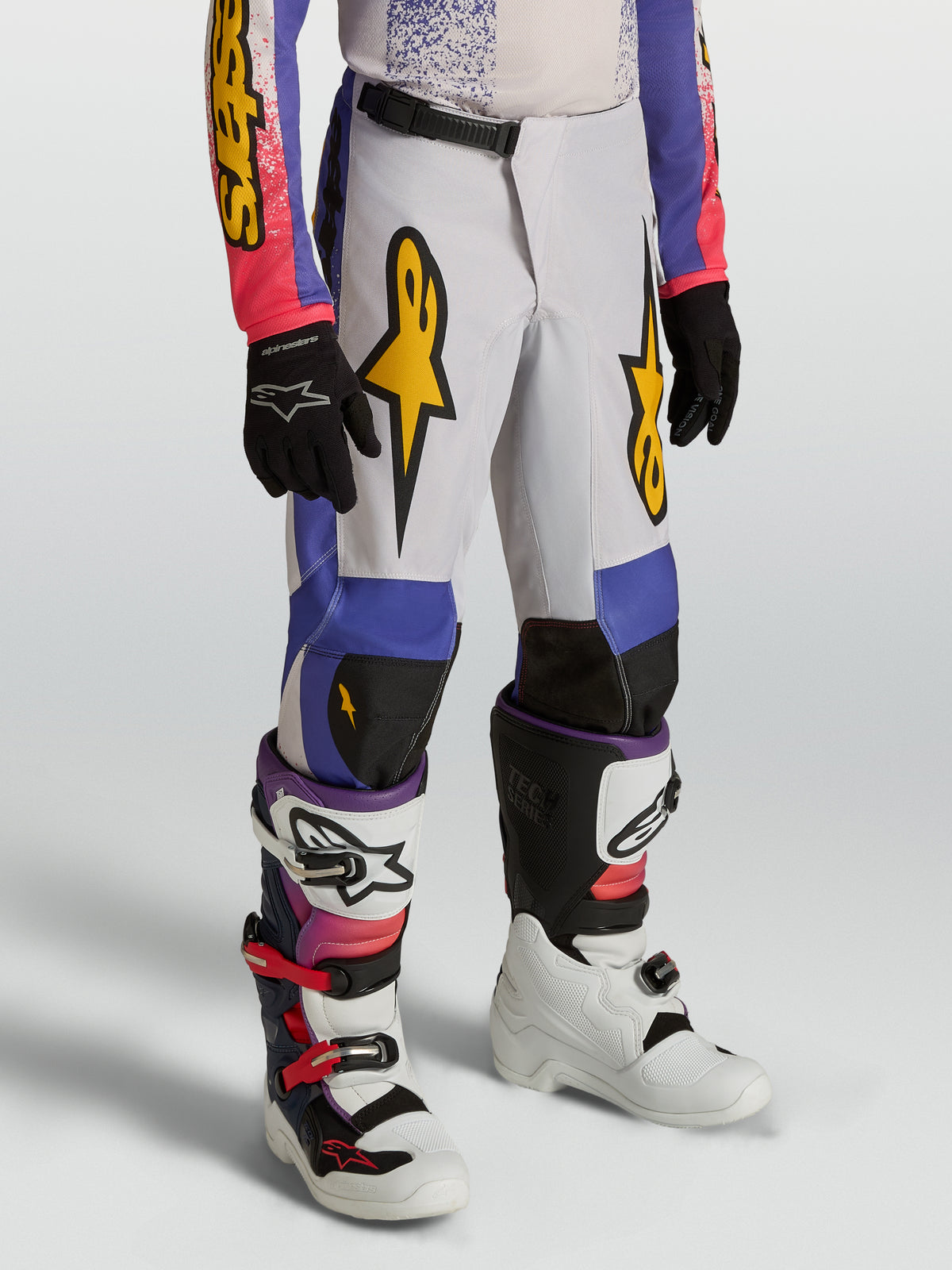 Alpinestars 2027 Fluid Drag bukser ungdom, motocrossbukser, blå og lilla, guldgrafik, ergonomisk forbuet design