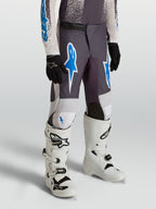 Alpinestars Youth Fluid Drag Pants, Motocross and Off-road Riding Pants, Youth, Gray and Blue with durable 600D polyfabric.