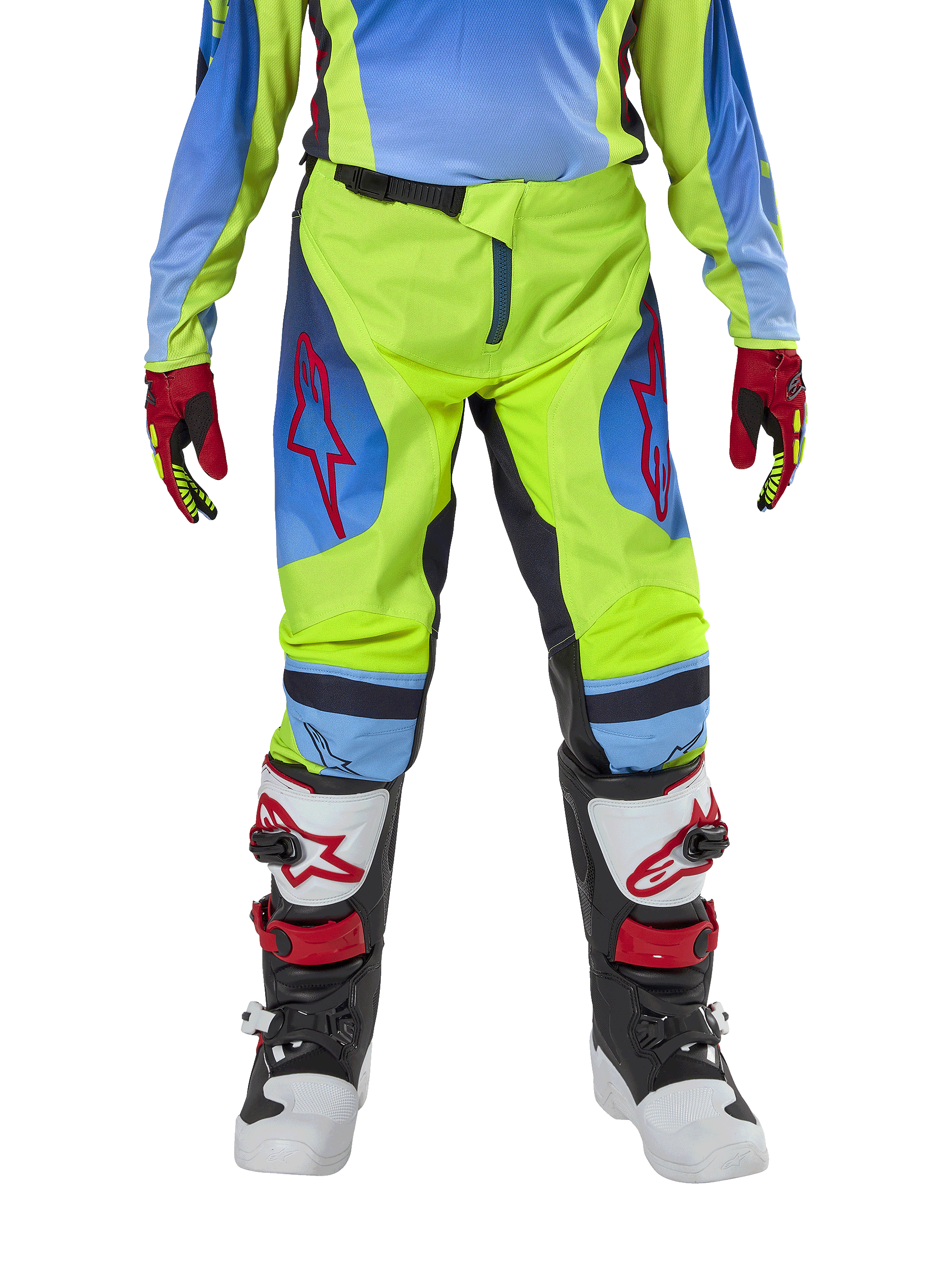 Alpinestars Youth 2024 Racer Hoen bukser, motocross-bukser, neon-gul og mørkeblå, med røde stjernelogoer på lårene, båret med matchende trøje, røde og sorte handsker samt hvide, sorte og røde motocross-støvler, holdbart udstyr til terrænkørsel