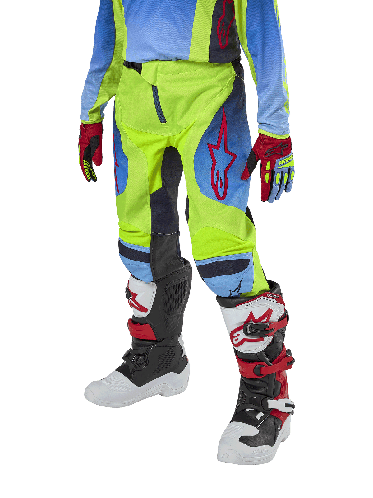 Alpinestars Youth 2024 Racer Hoen Pants, Motocross Pants, Yellow Fluo and Blue Night Navy with red accents, worn with matching gloves and white, black, and red boots, featuring a sport fit and pre-curved legs for off-road racing