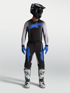Alpinestars Supertech Hiten AFD trøje og køresæt til herrer, sort og blå motocross-beklædning med ergonomisk pasform.