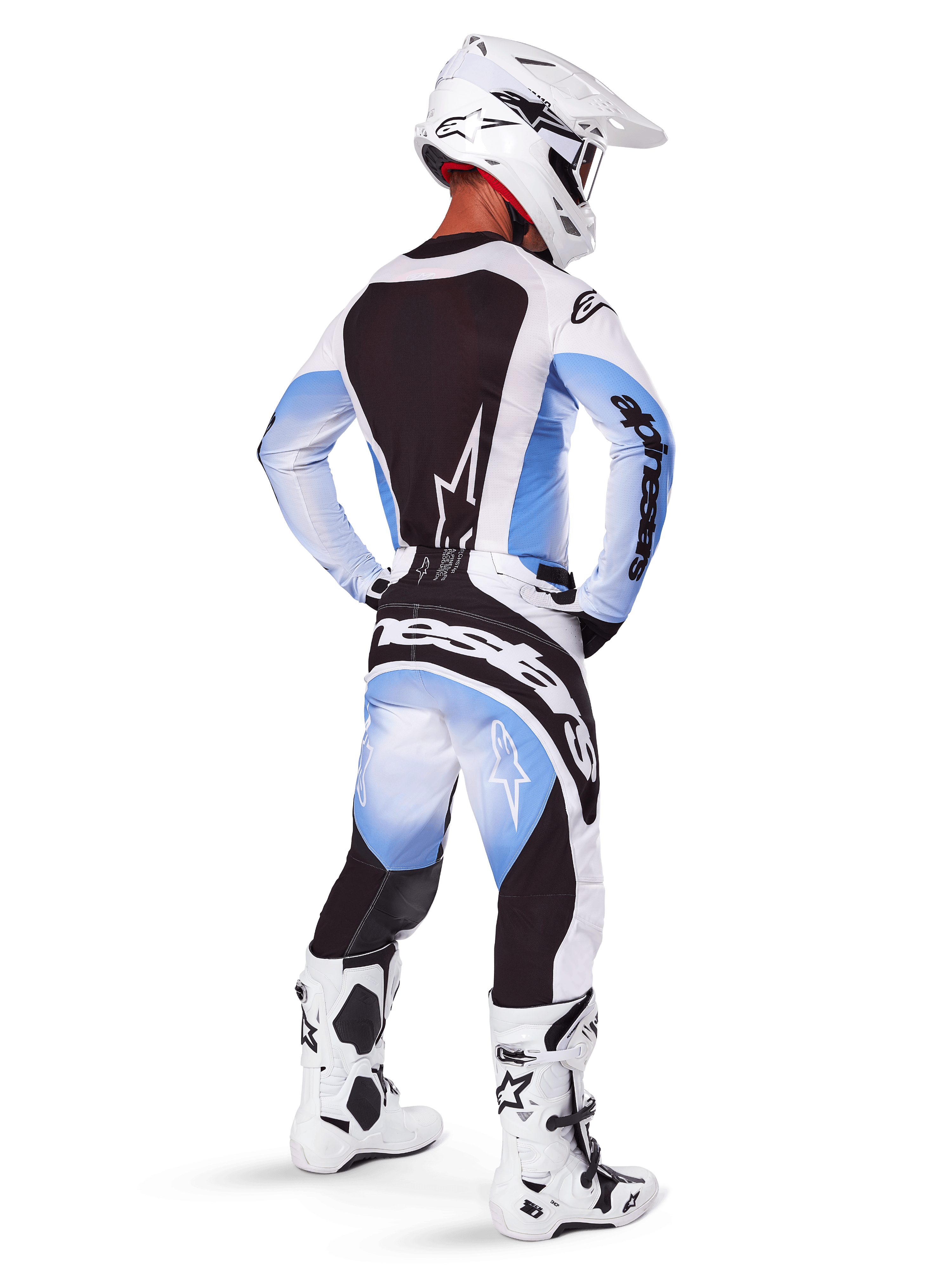 Alpinestars 2025 Techstar Melt Gear Set, komplet motocross-udstyr, hvid og lyseblå trøje med sort rygpanel, matchende bukser med blå gradient og sorte detaljer, hvid hjelm og hvide og sorte støvler, koordineret outfit til off-road racing