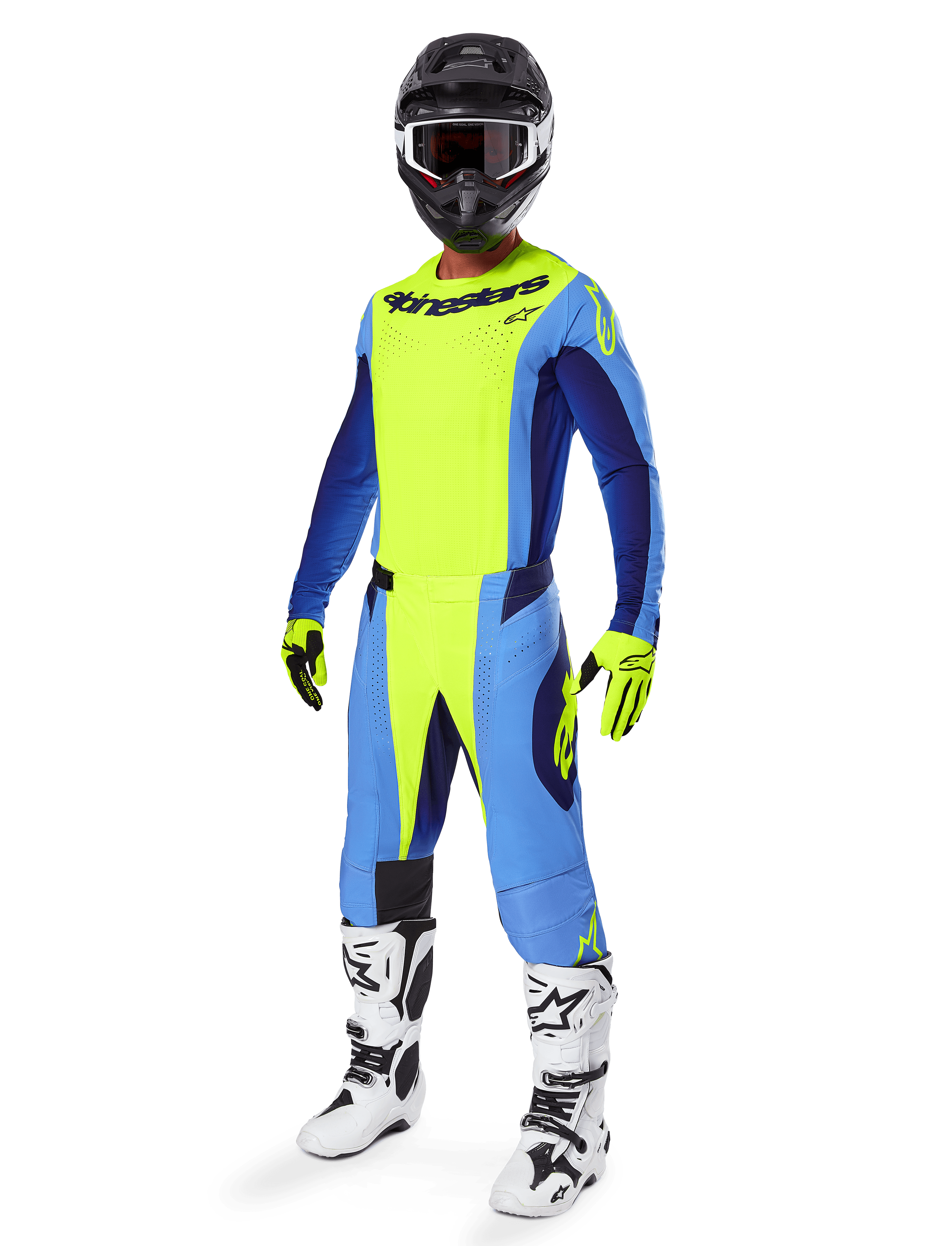 Motocross rider wearing Alpinestars 2025 Techstar Melt Jersey, Yellow Fluo and Blue, paired with matching pants, black helmet with goggles, yellow gloves, and white and black boots, complete coordinated performance gear for off-road racing