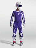 Alpinestars Supertech Vesta trøje og Gear Sets i mørkeblå og hvid, professionelt motocrossudstyr med atletisk pasform.
