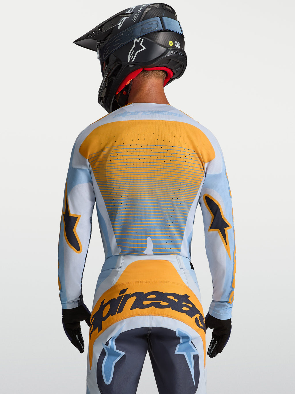 Alpinestars Techstar Maven trøje, herre-motocrosstrøje, blå og orange, set bagfra med laserskåret ventilation til MX.