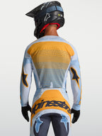 Alpinestars Techstar Maven trøje, herre-motocrosstrøje, blå og orange, set bagfra med laserskåret ventilation til MX.