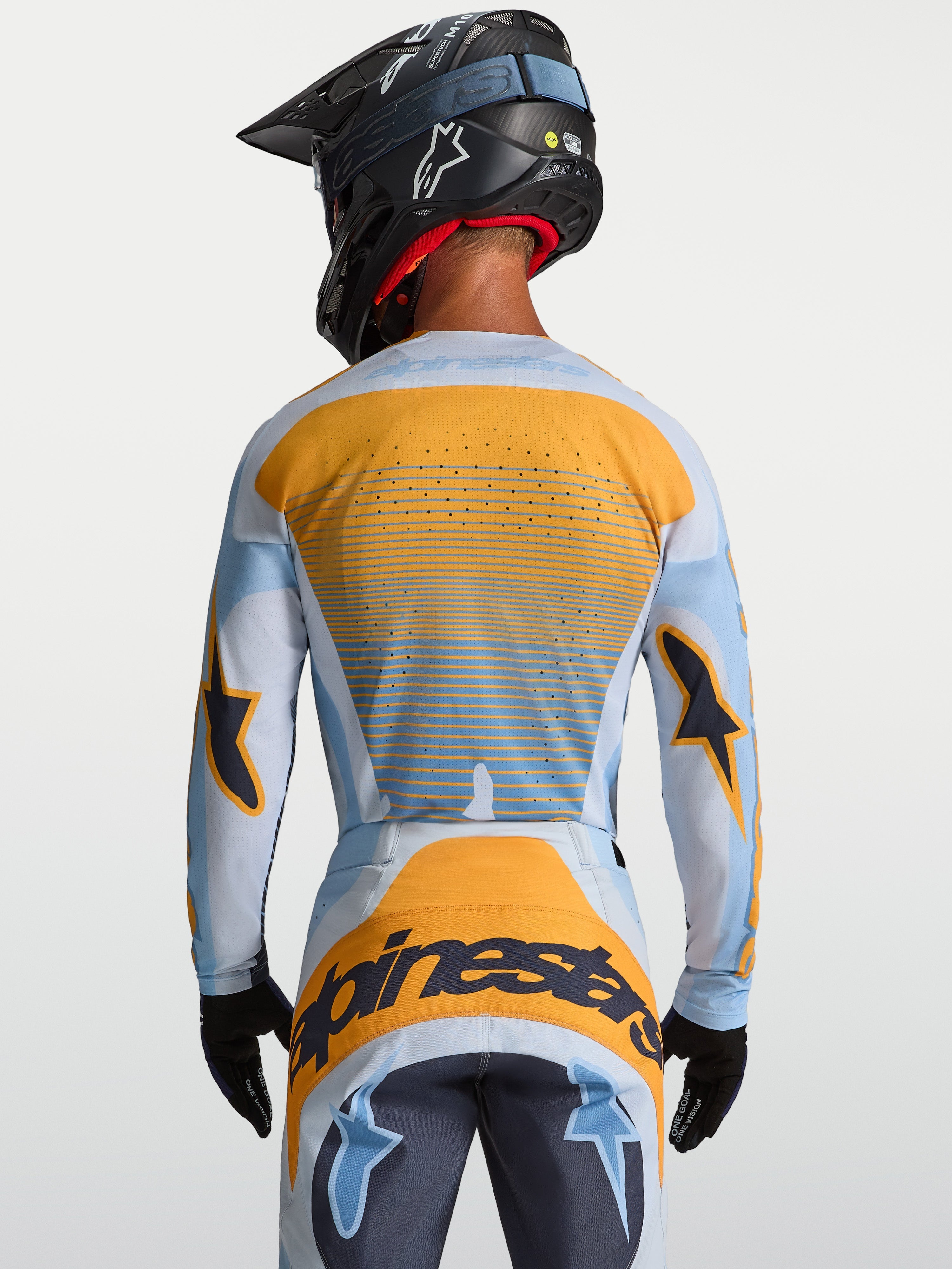 Alpinestars Techstar Maven trøje, herre-motocrosstrøje, blå og orange, set bagfra med laserskåret ventilation til MX.