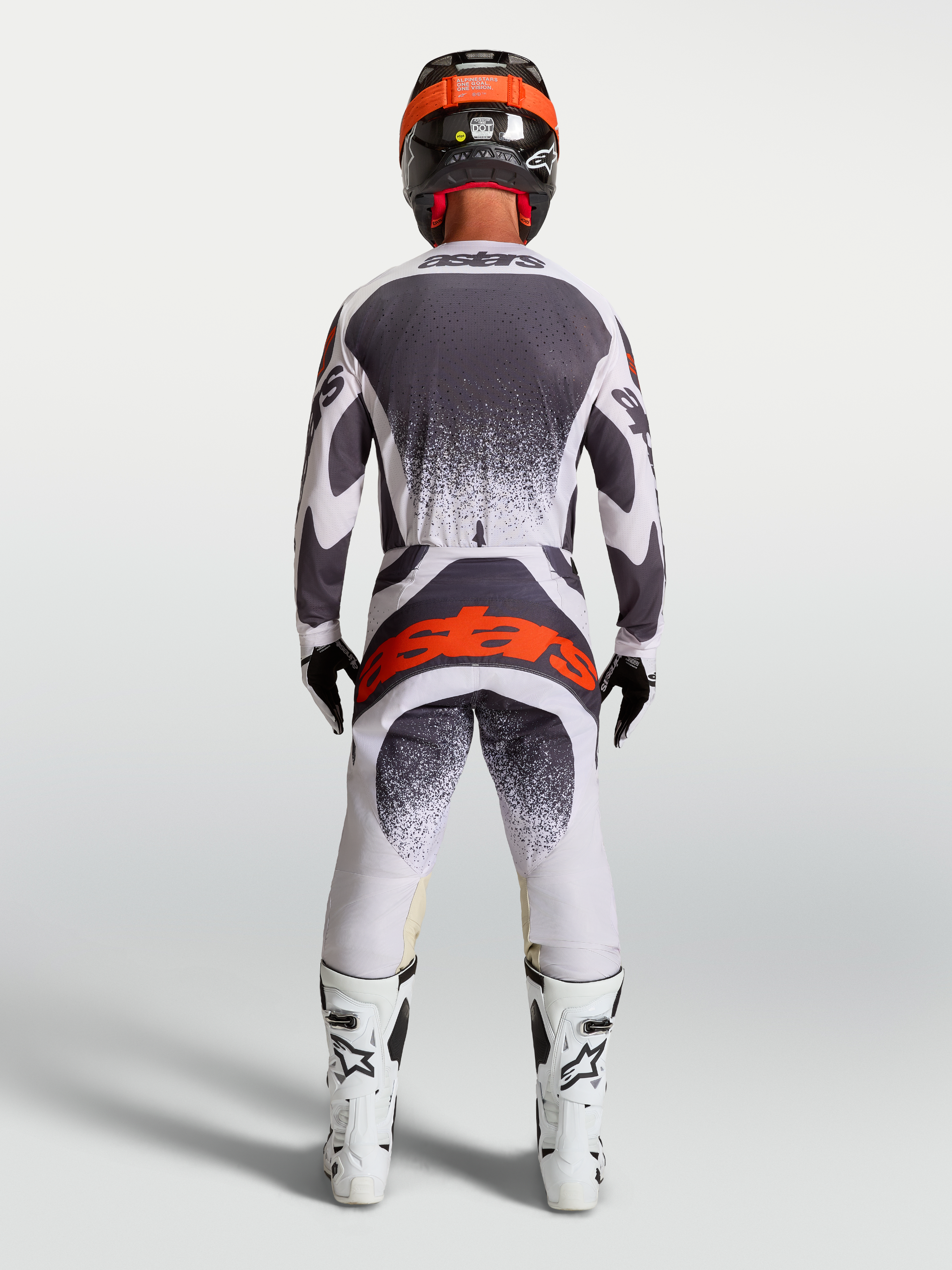 Alpinestars Techstar Swan Jersey and Gear Set, gray and white motocross gear with a red logo, rear on-model view.