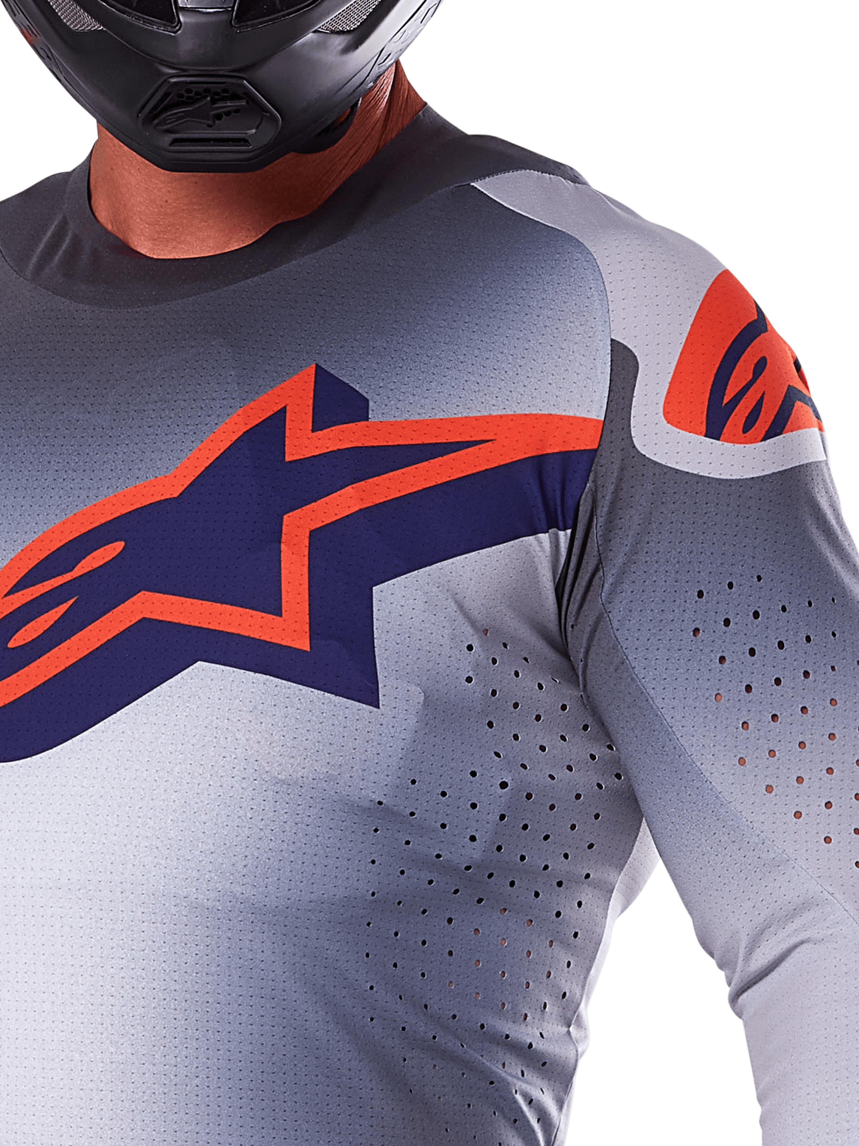 Alpinestars 2025 Supertech Lipan Jersey, motocross trøje, grå orange fluo, med stort marineblåt og orange stjernelogo på brystet, laserskårne perforeringer for luftgennemstrømning, letvægts mesh-konstruktion, bæres med en sort hjelm