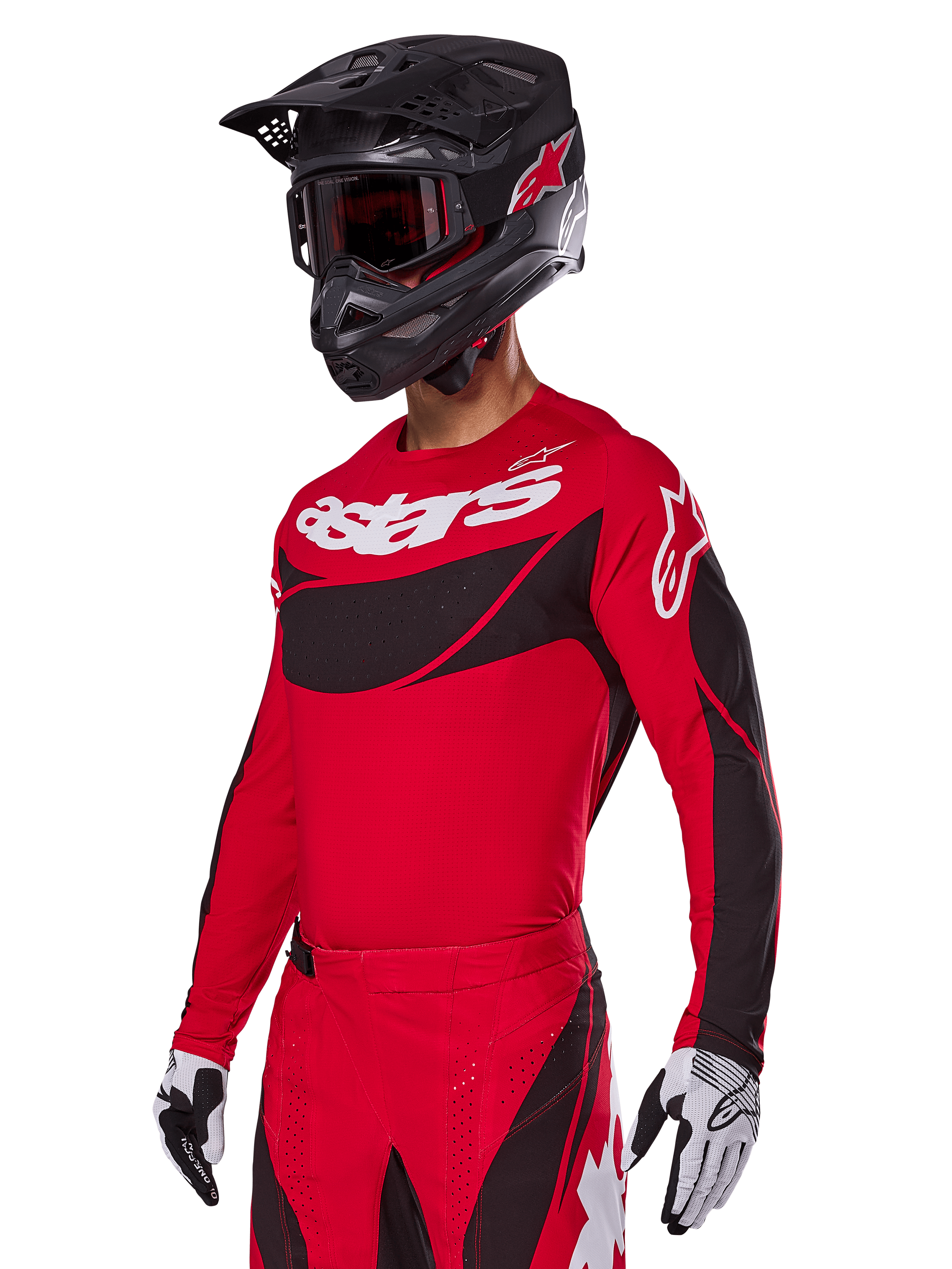 Alpinestars 2025 Techstar Dreem-udstyrssæt, rød motocross-jersey og bukser med sorte og hvide detaljer, her vist med sort hjelm og goggles, hvide og sorte handsker, med markant 'astars'-branding, designet til højtydende off-road-kørsel