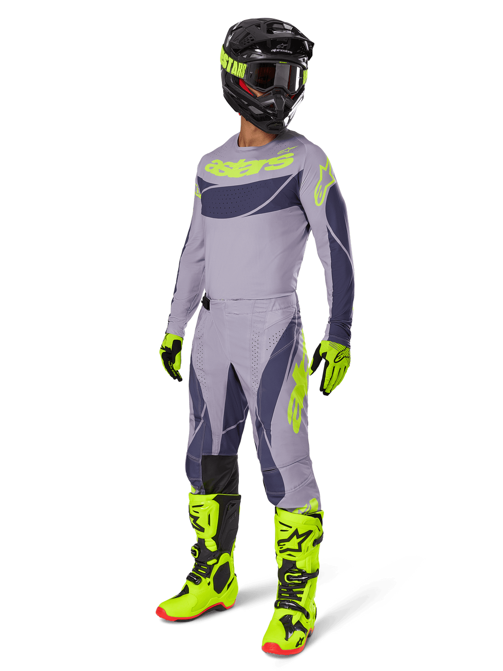 Alpinestars 2025 Techstar Dreem Gear Set, Motocross rider in full racing outfit, gray jersey and pants with dark gray patterns and neon yellow-green accents, matching black helmet, neon yellow-green gloves and boots, performance off-road gear