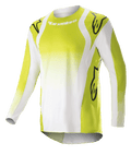 Alpinestars 2023 Techstar Push Jersey, langærmet motocross-trøje, gul fluo og hvid, med store sorte Astars-logoer på skuldre og ærmer, perforeret performance-stof, rund halsudskæring og forlænget rygstykke til off-road racing