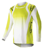 Alpinestars 2023 Techstar Push Jersey, langærmet motocross-trøje, gul fluo og hvid, med store sorte Astars-logoer på skuldre og ærmer, perforeret performance-stof, rund halsudskæring og forlænget rygstykke til off-road racing