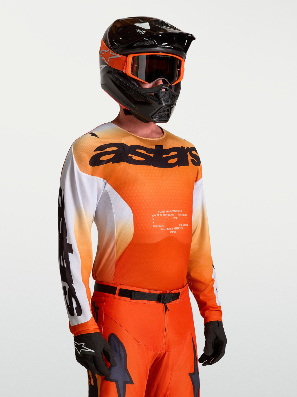 Alpinestars Racer Amber Trøje, herre-motocrosstrøje i orange og hvid, letvægts poly-stof med ergonomisk race pasform.
