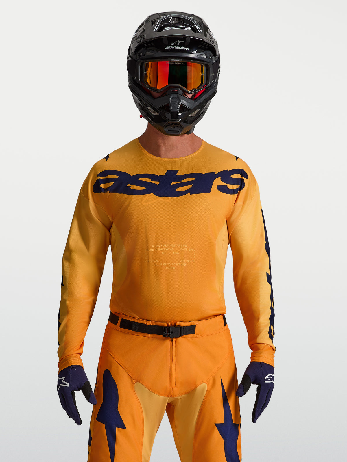 Alpinestars Racer Amber trøje, herremotocrosstrøje i orange og mørkeblå, lavet af fugttransporterende polyfabric.