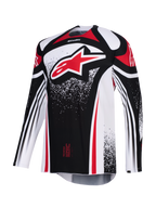 Alpinestars 2026 Techstar Nomur Jersey, motocross-trøje, sort, hvid og rød, med et stort rødt Astars-logo på brystet, prikkede grafiske mønstre, lange ærmer og atletisk race fit til højtydende off-road-konkurrence