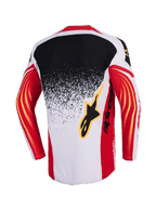Alpinestars 2026 Techstar Nomur trøje, motocross-trøje, lysegrå, rød og sort, set bagfra med et sort til lysegrå gradient splatter-design, røde ærmer med gule buede detaljer og sort Alpinestars-logo på ryggen.