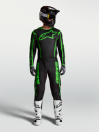 Alpinestars Fluid Apex V2 bukser, herre motocross-udstyr, sort og neon-grøn, komplet racersæt med hvide støvler.