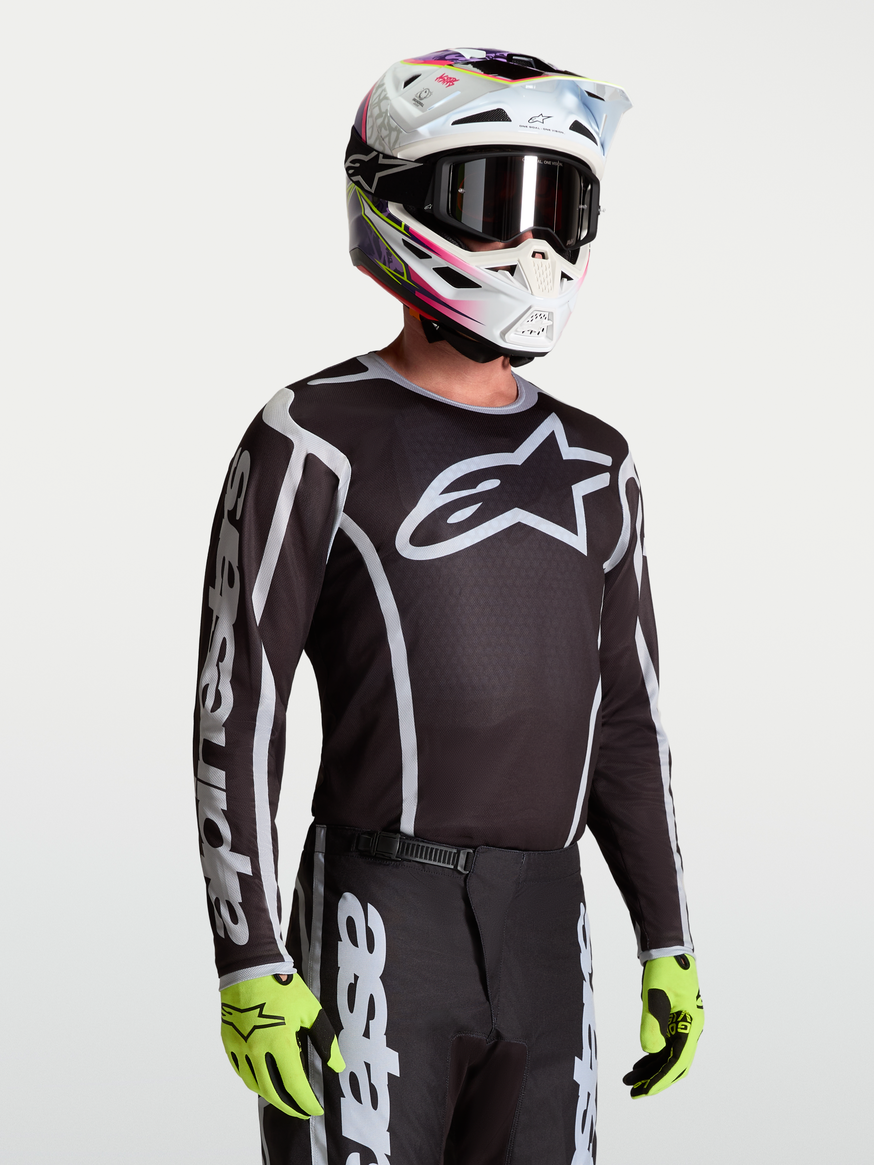Alpinestars Fluid Apex V2 trøje, herre-motocross-trøje i sort og sølv, åndbart og fugttransporterende polyfabric.