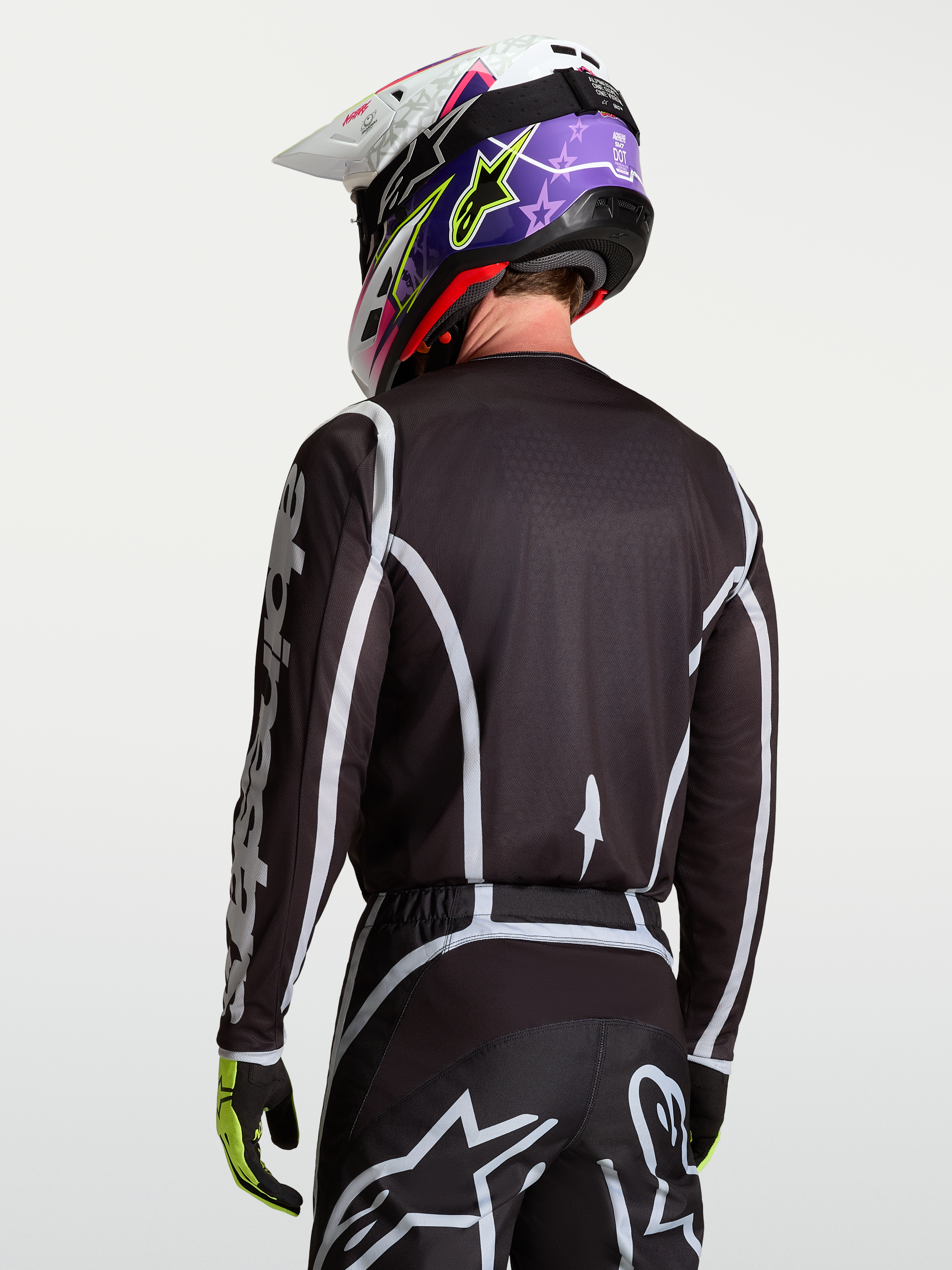 Alpinestars Fluid Apex V2 trøje, motocross racingtrøje til herrer, sort og sølv, fugttransporterende polyfabrik, set bagfra på model