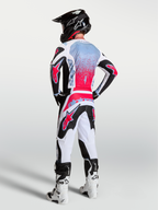 Alpinestars Fluid Drag trøje, herre-motocrossudstyr i sort og rød fluo, åndbart tekstil, set bagfra på model.