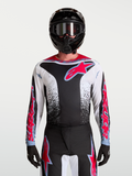Alpinestars Fluid Drag trøje, herre-motocrosstrøje i sort, hvid og rød med aggressiv grafik til terrænkørsel, set på model.