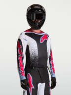Alpinestars Fluid Drag trøje, herre-motocrosstrøje i sort og hvid med røde detaljer, let og åndbart tekstil.