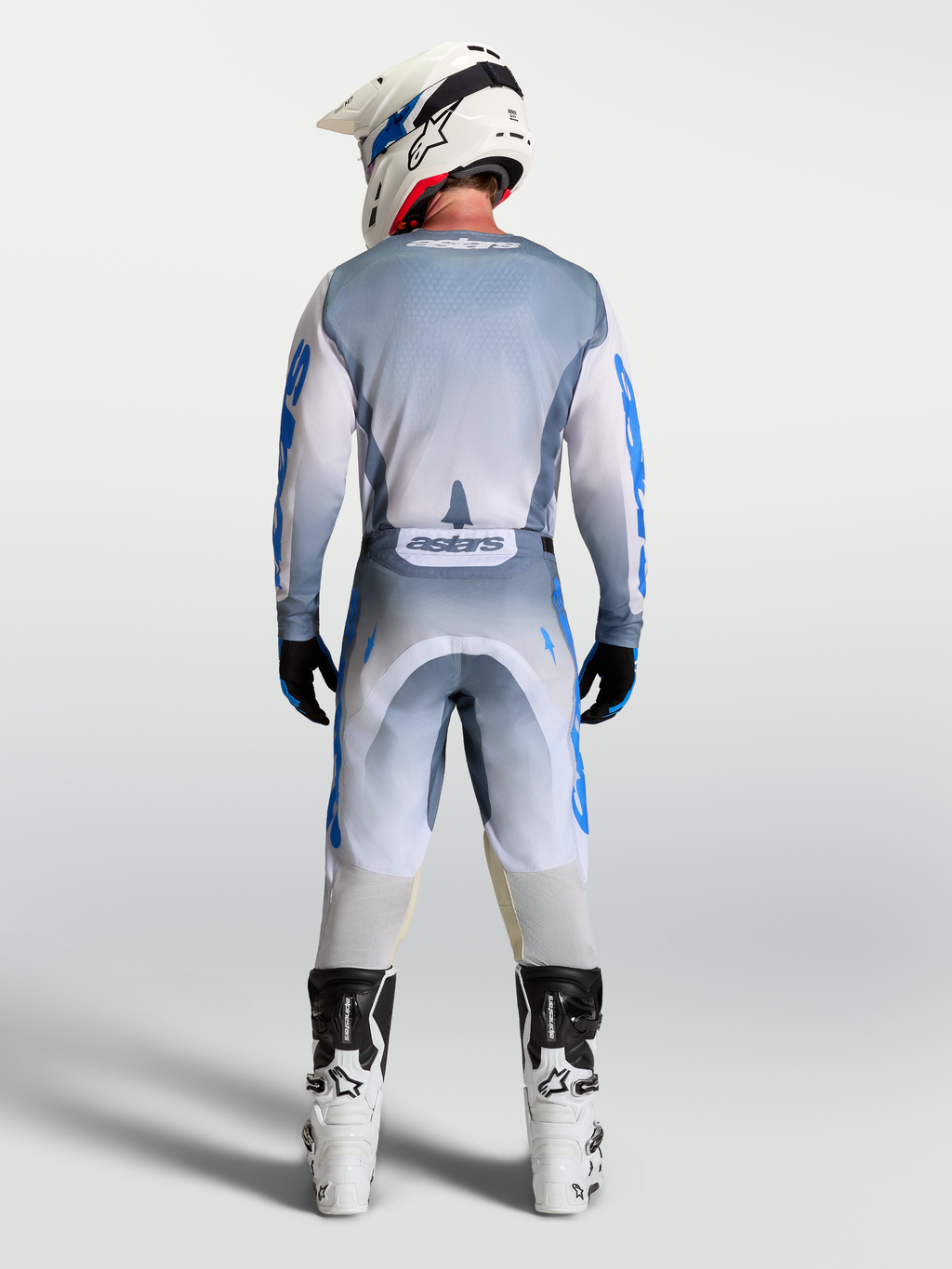 Alpinestars Racer Amber bukser og udstyrssæt, herre-motocrossudstyr i grå og blå, set bagfra.