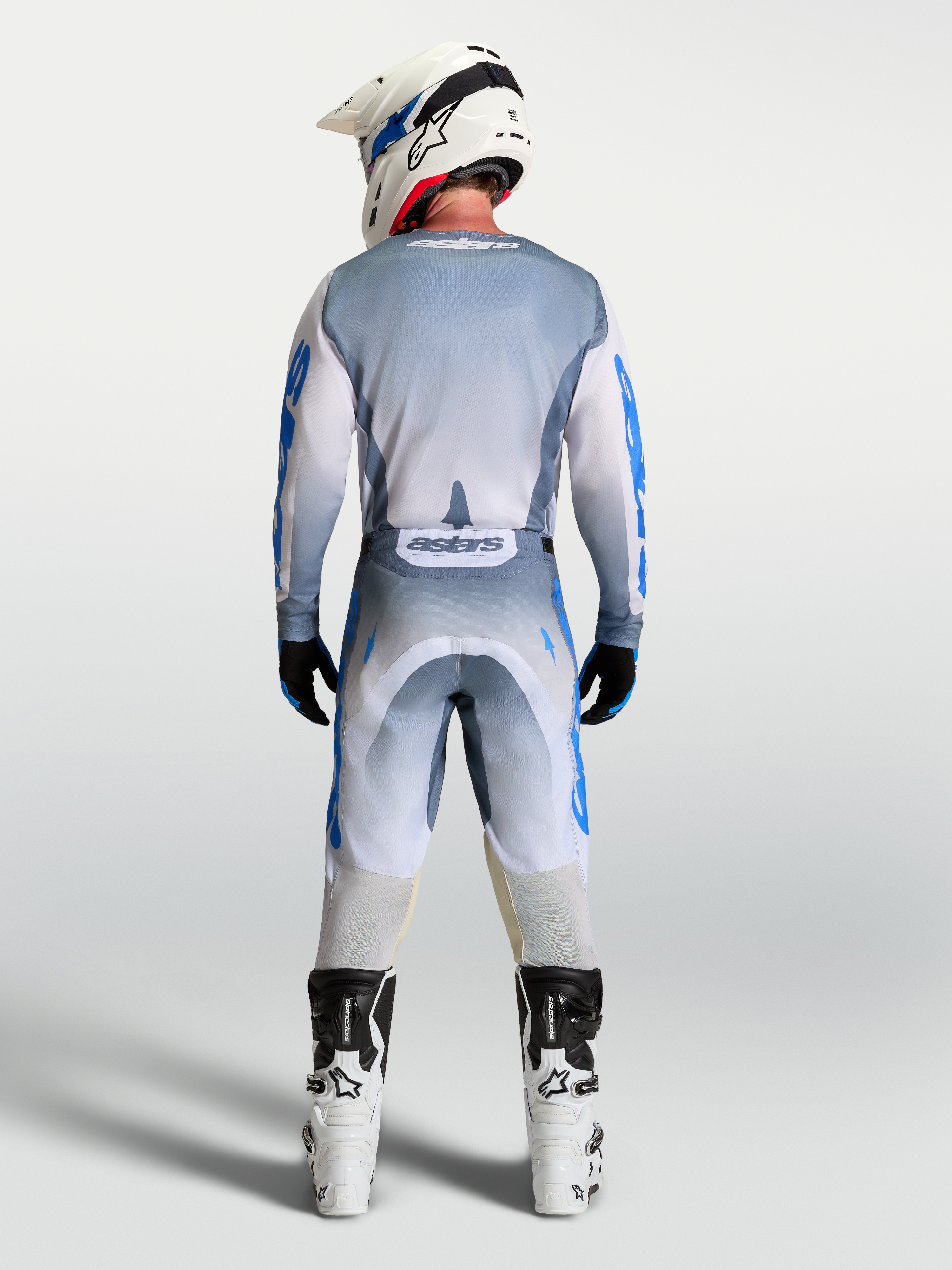 Alpinestars Racer Amber bukser og udstyrssæt, herre-motocrossudstyr i grå og blå, set bagfra.