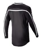 Alpinestars 2023 Racer Found Jersey, sort motocross-trøje, set bagfra med hvide striber over skuldre og ærmer, langærmet design med forlænget bagstykke for dækning, letvægts og åndbart performance-udstyr