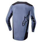 Alpinestars 2024 Fluid Lurv trøje, motocross trøje, lyseblå og sort, set bagfra med Alpinestars-branding på ærmerne og stjernelogo bagpå, forlænget ryg, åndbart performancestof til off-road racing