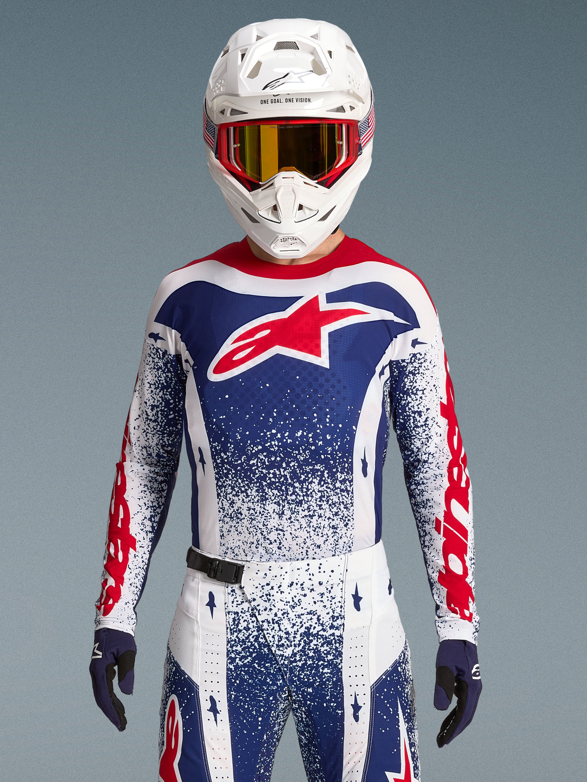 Alpinestars Limited Edition Techstar Unity Jersey, a red, white, and blue motocross top with an athletic race fit.