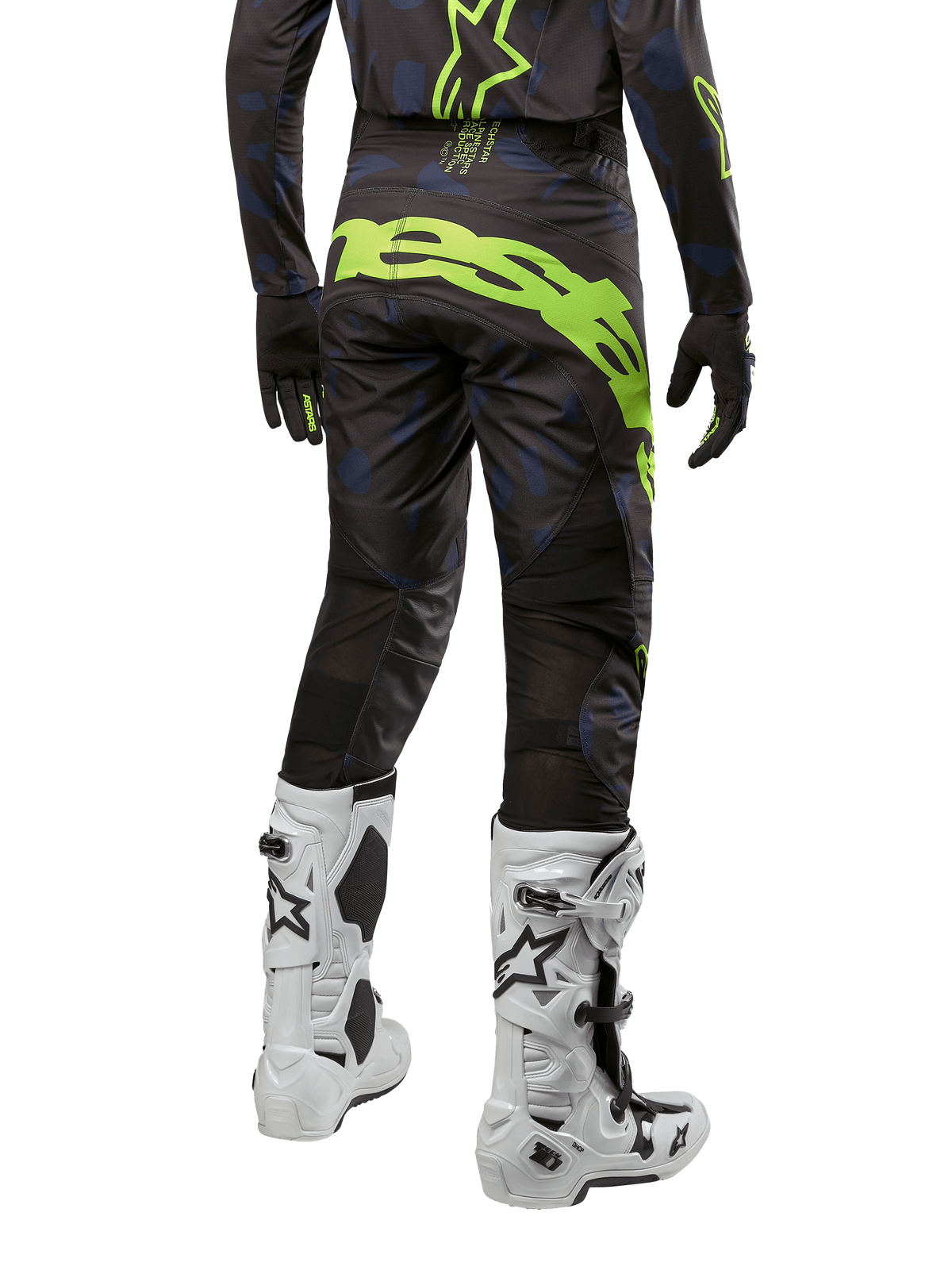 Alpinestars 2024 Techstar Rantera bukser, motocrossbukser, sort, navy og gul fluo, set bagfra, med markant neongul grafik og ventilationspaneler i mesh, båret med matchende trøje og hvide støvler, slidstærkt udstyr til motocross og off-road kørsel