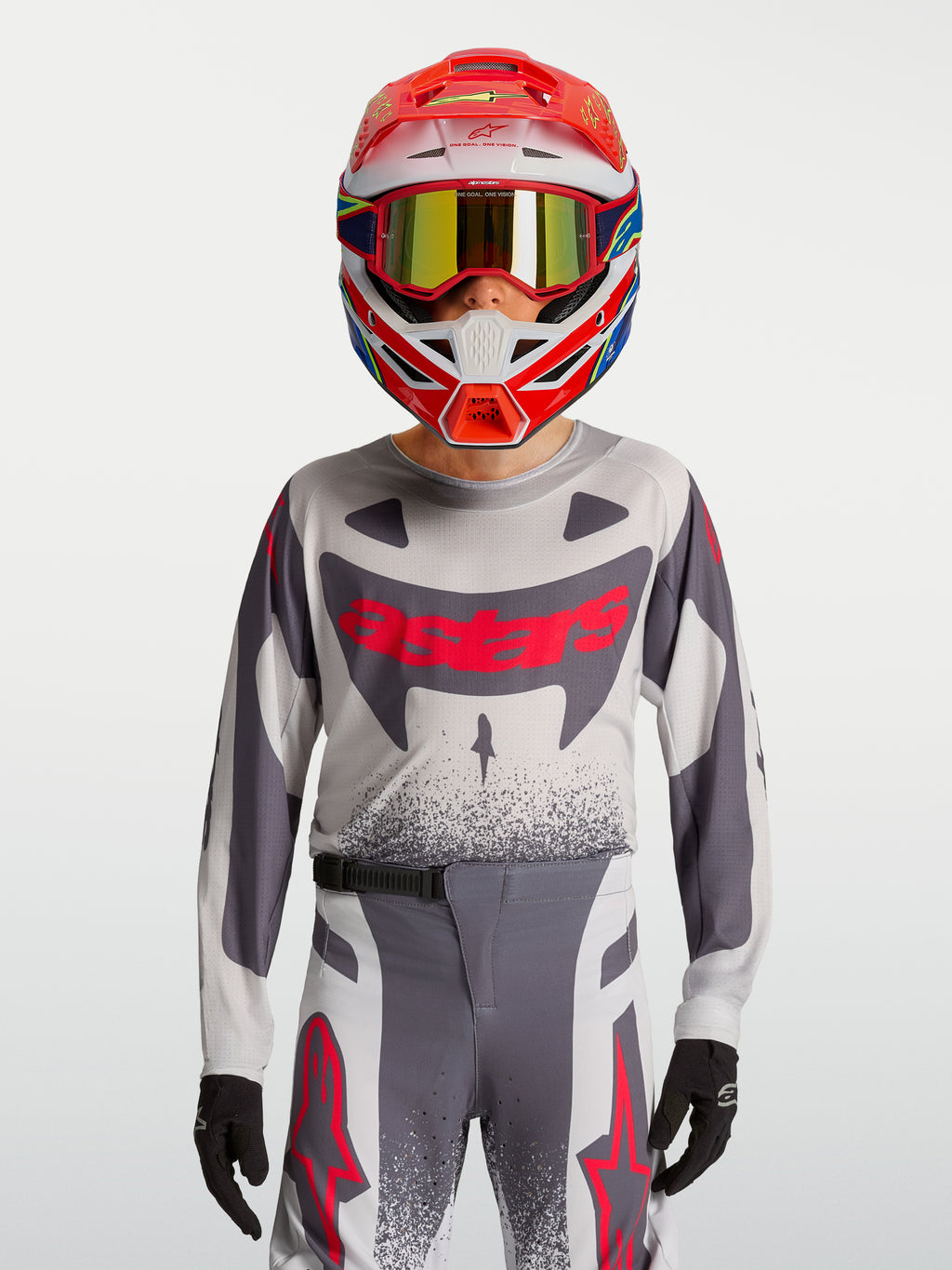 Alpinestars Supertech Swan trøje og gearsæt til ungdom, grå og rød fluo, åndbar strækmesh til motocross.