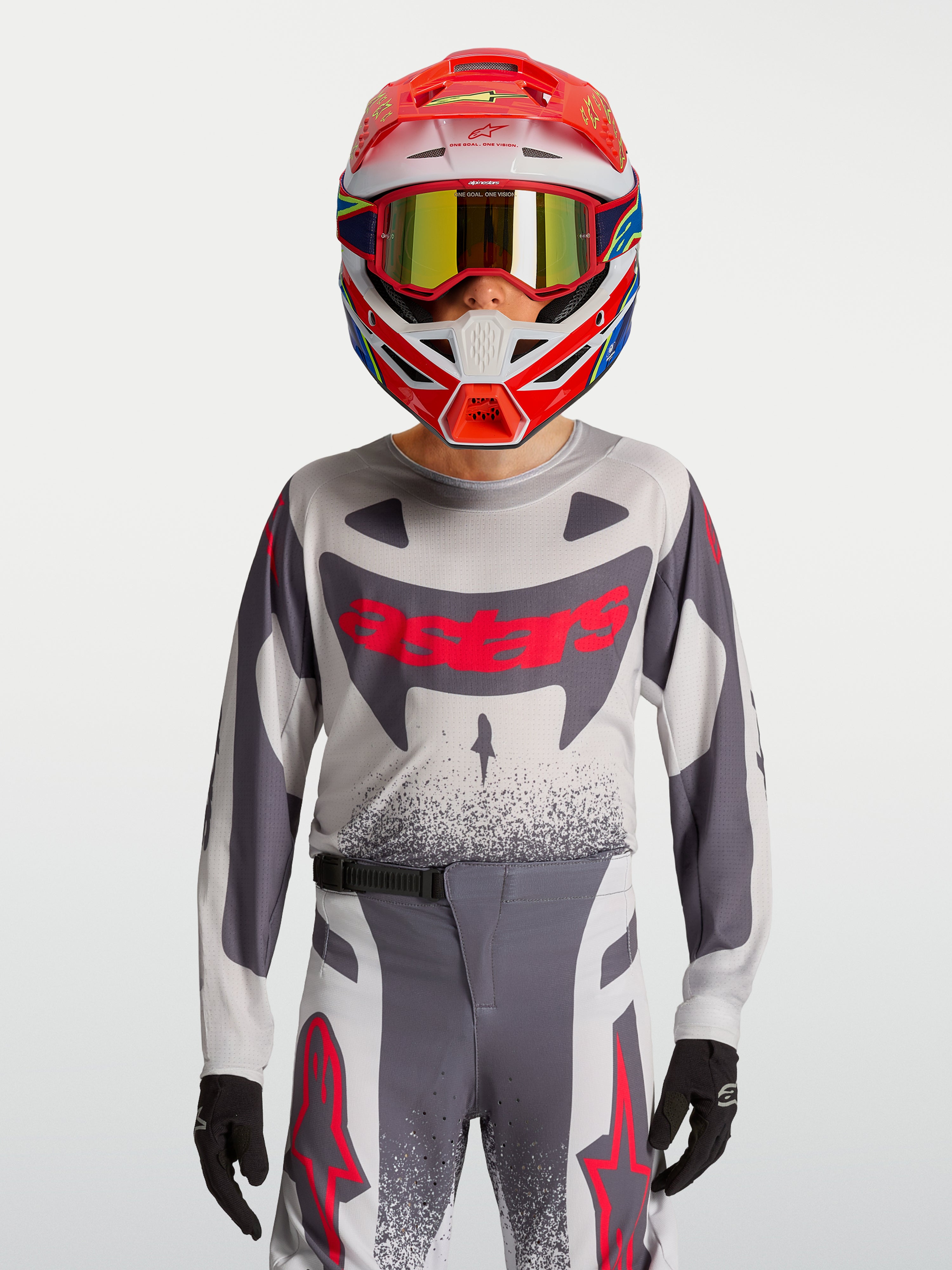 Alpinestars Supertech Swan trøje og gearsæt til ungdom, grå og rød fluo, åndbar strækmesh til motocross.