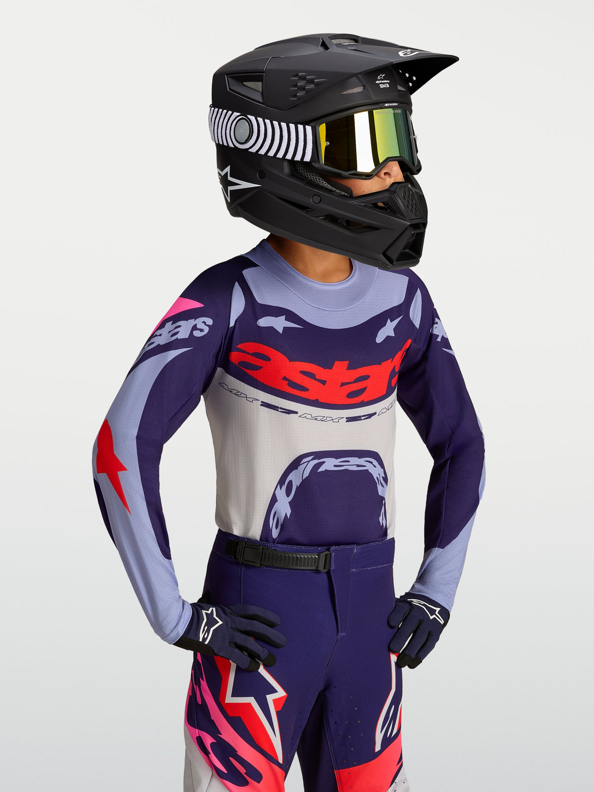 Alpinestars Youth Supertech Dyna Jersey, purple and red lightweight motocross jersey with athletic race-fit on-model.