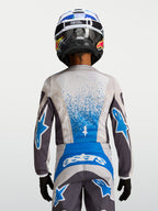 Alpinestars Youth Fluid Drag Jersey, gray and blue motocross racing gear with breathable polyfabric construction.