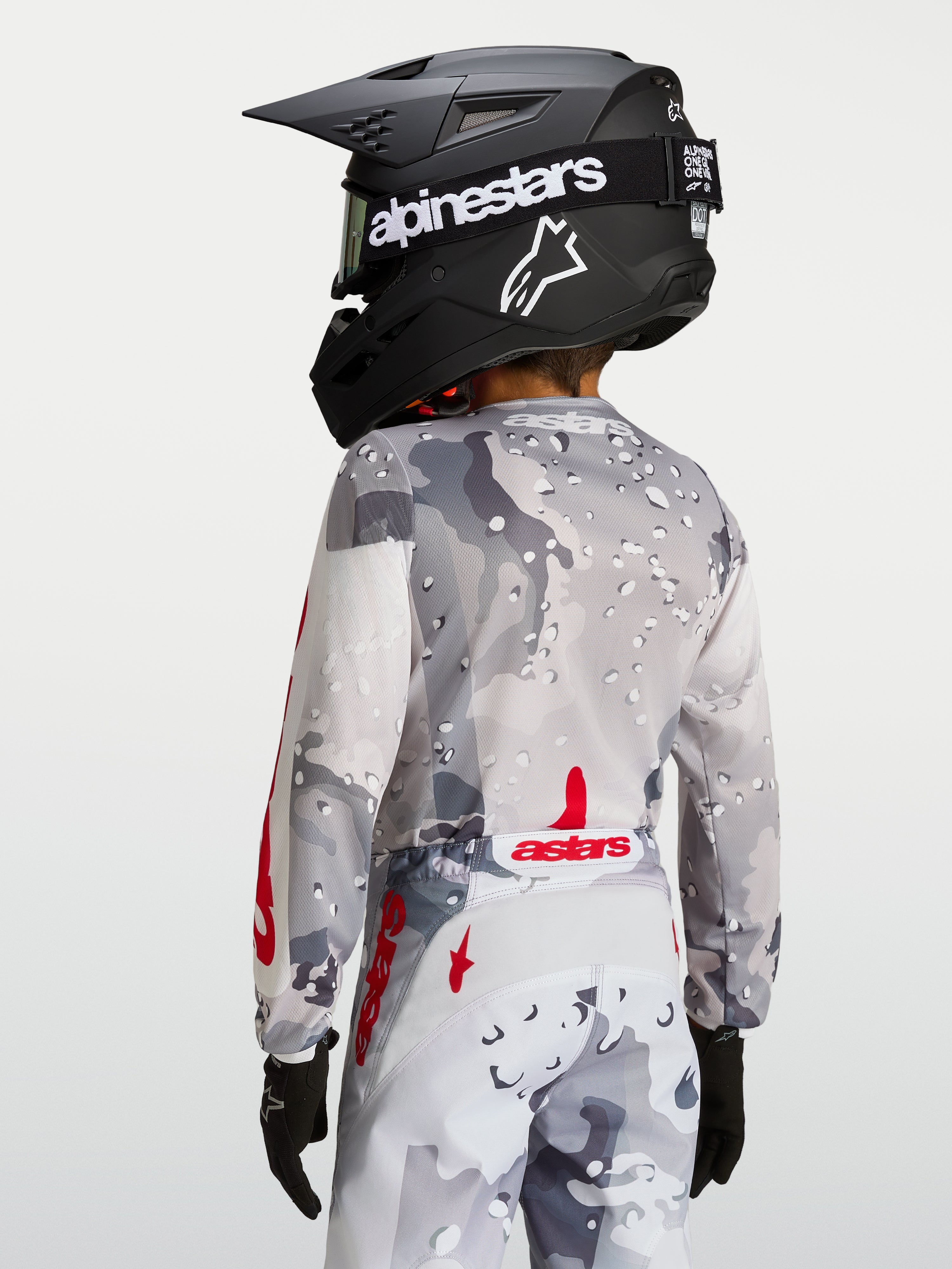 Alpinestars Youth Fluid Lone Jersey, Gray Camo and Red motocross top, rear view showing ergonomic fit and extended rear hem.