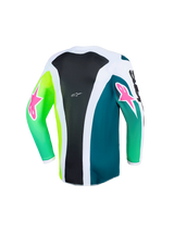 Alpinestars 2026 Youth Fluid Portl Jersey, motocrosstrøje, grøn, hvid og sort, set bagfra med et sort midterpanel med hvide striber, neongrønne og tealfarvede ærmer med lyserøde stjernelogoer, åndbart polyfabrik til motocross-racerløb for unge