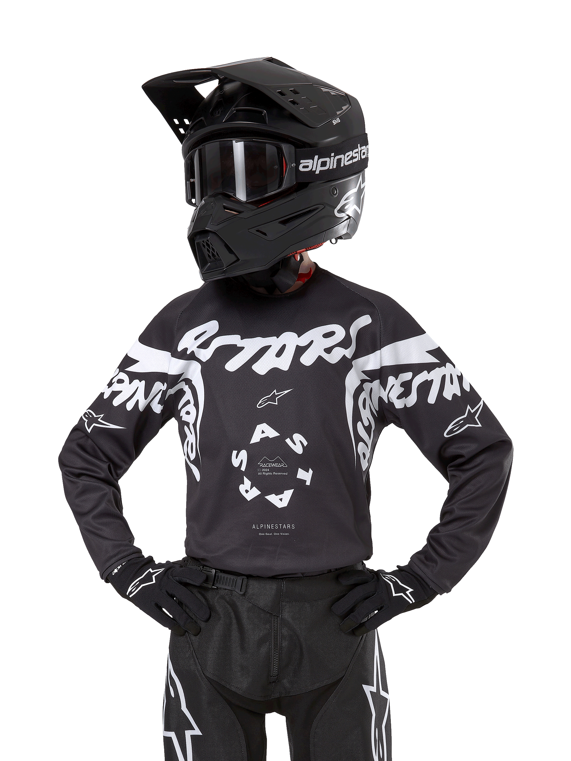 Alpinestars 2024 Youth Racer Hana trøje, motocross-trøje til unge, sort med hvid grafik og logoer, vist med sort hjelm og handsker, holdbart og let materiale til terrænkørsel