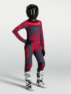 Alpinestars Stella Techstar Swan Jersey AND Gear Set, women's crimson and dark gray motocross outfit with white boots.