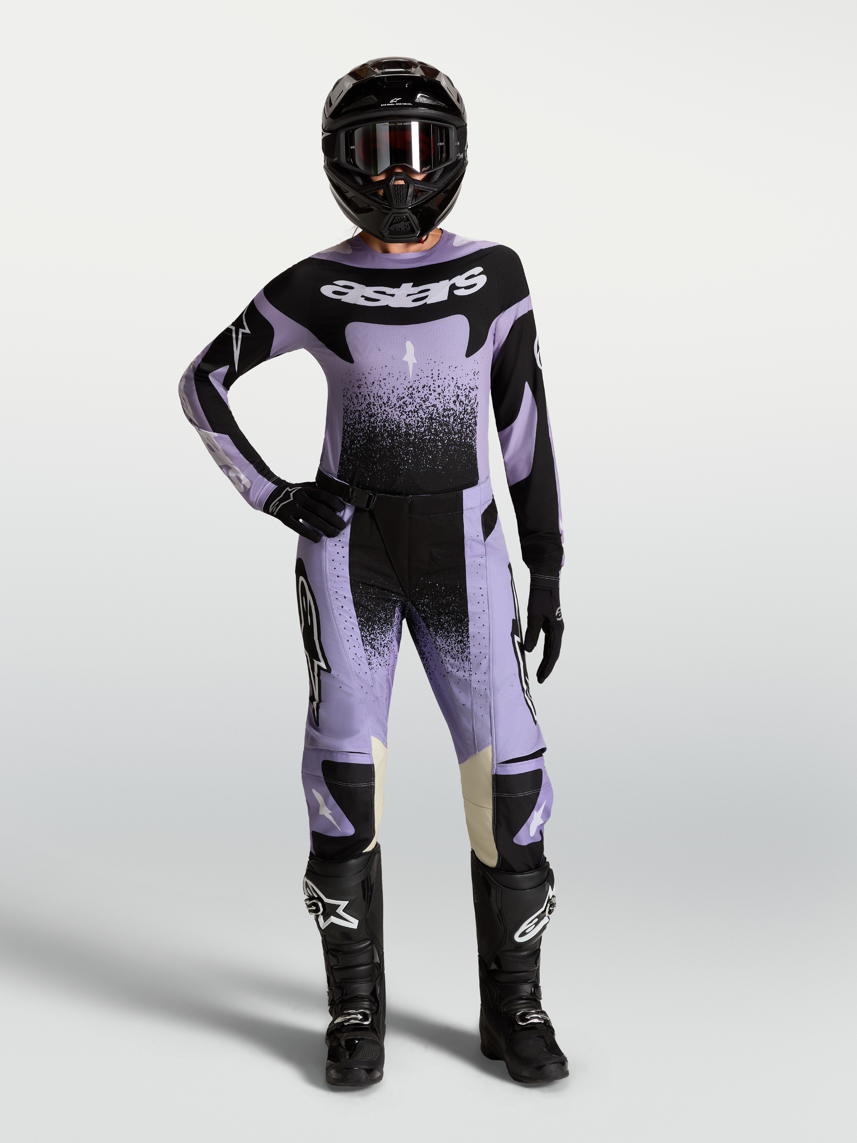 Alpinestars Stella Techstar Swan udstyrssæt, dame-motocrossudstyr i lilla og sort med trøje og bukser.