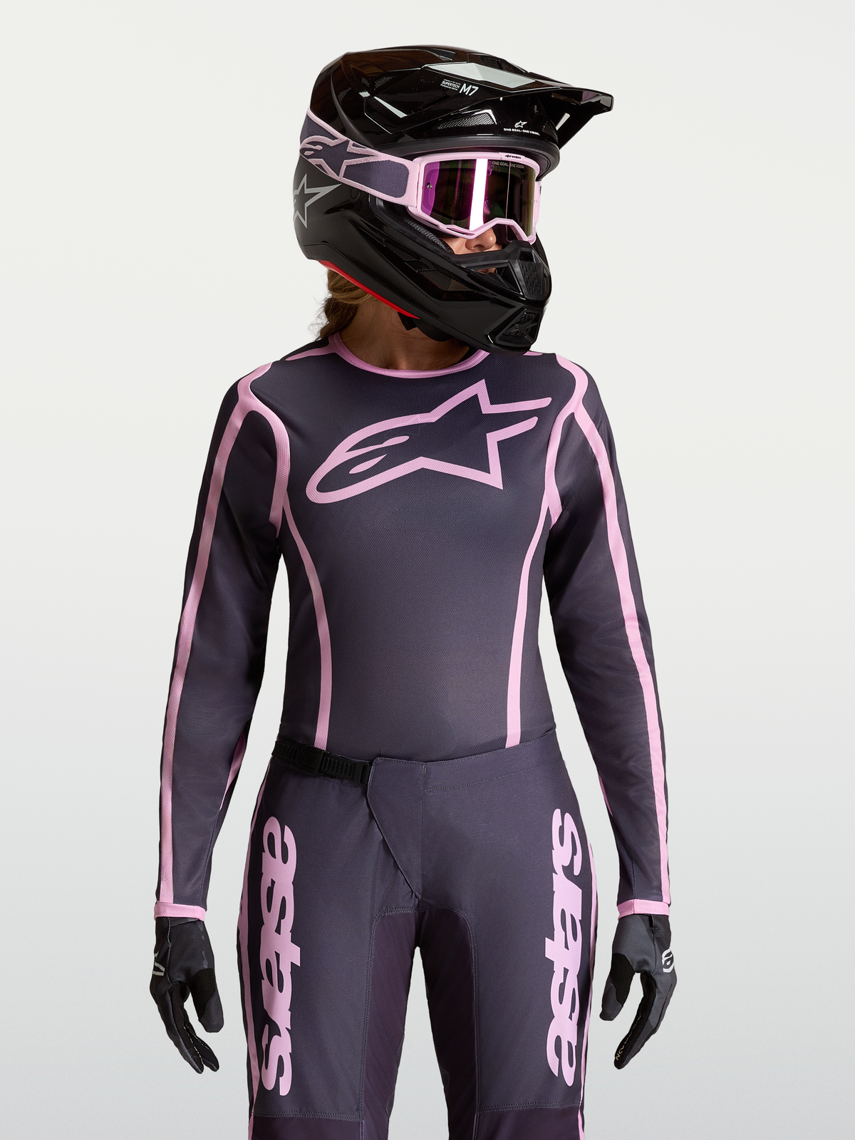 Alpinestars Stella Fluid Apex V2 Trøje, motocrosstrøje til damer i grå og pink med en ergonomisk atletisk pasform.