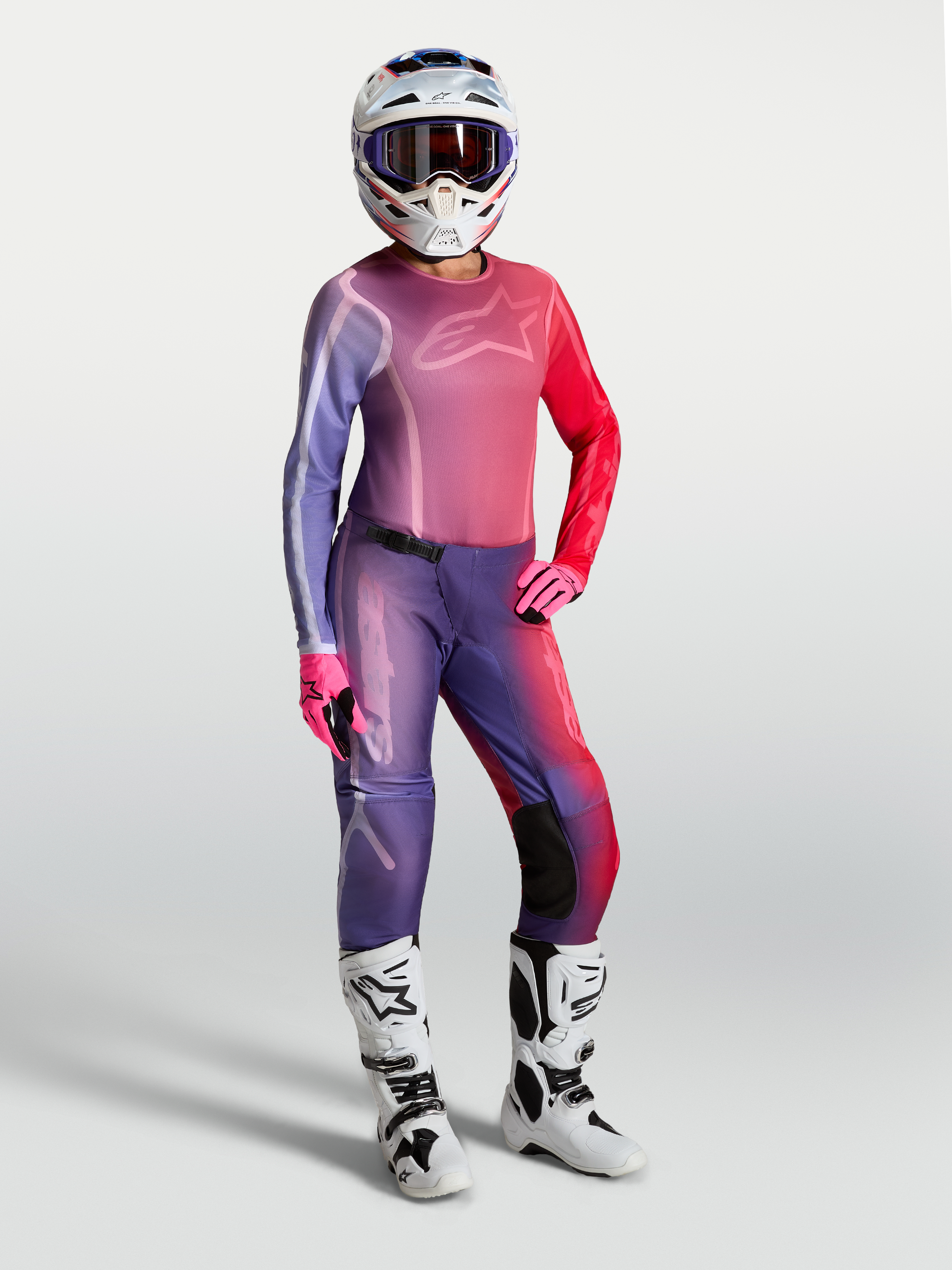 Alpinestars Stella Fluid Kepler Gear Set og bukser, motocross-udstyr til kvinder i lilla og rød gradient.