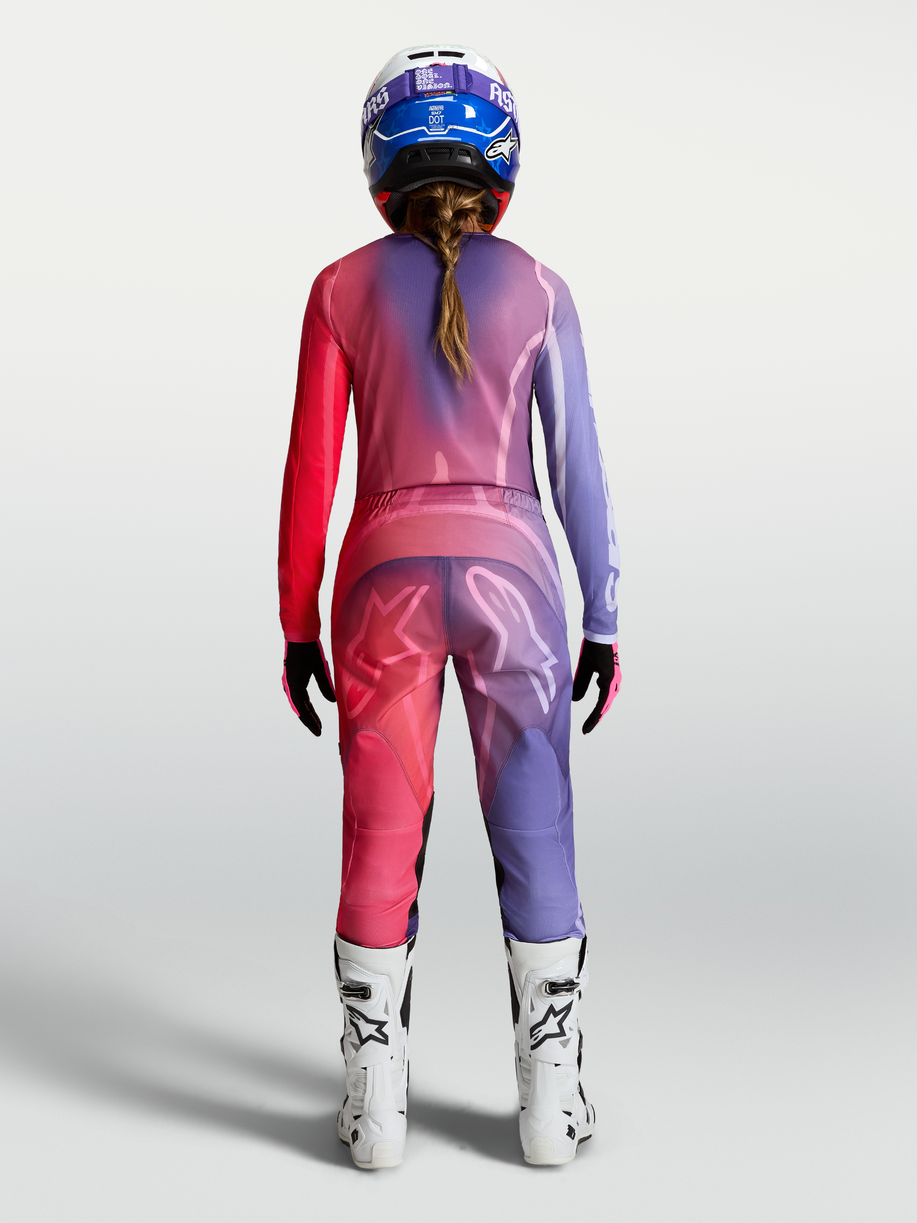 Alpinestars Stella Fluid Kepler Bukser og Udstyrssæt, motocrossudstyr til damer i lilla og rød set bagfra.