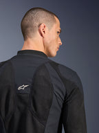 Alpinestars Troop-Air Pro Jakke, sort, nærbillede af ryggen med åndbare tech-mesh-paneler og et hvidt stjerne-logo, premium pansret luftjakke til motorcykelkørsel
