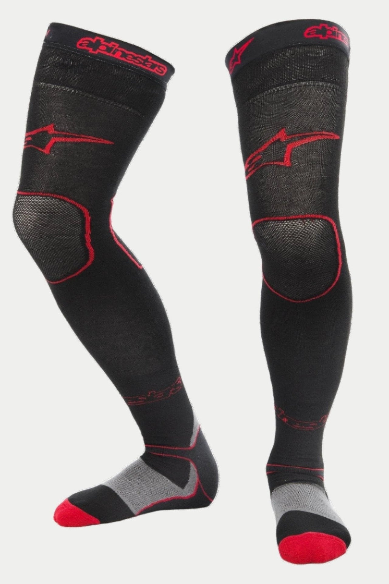 Alpinestars MX Long Tech tykke strømper, motocross-strømper, sort og rød, med røde Alpinestars-logoer på låret og kanten, grå hæl og røde tå-detaljer, midt-på-låret længde med specielle mesh-zoner, teknisk baselayer til off-road racing